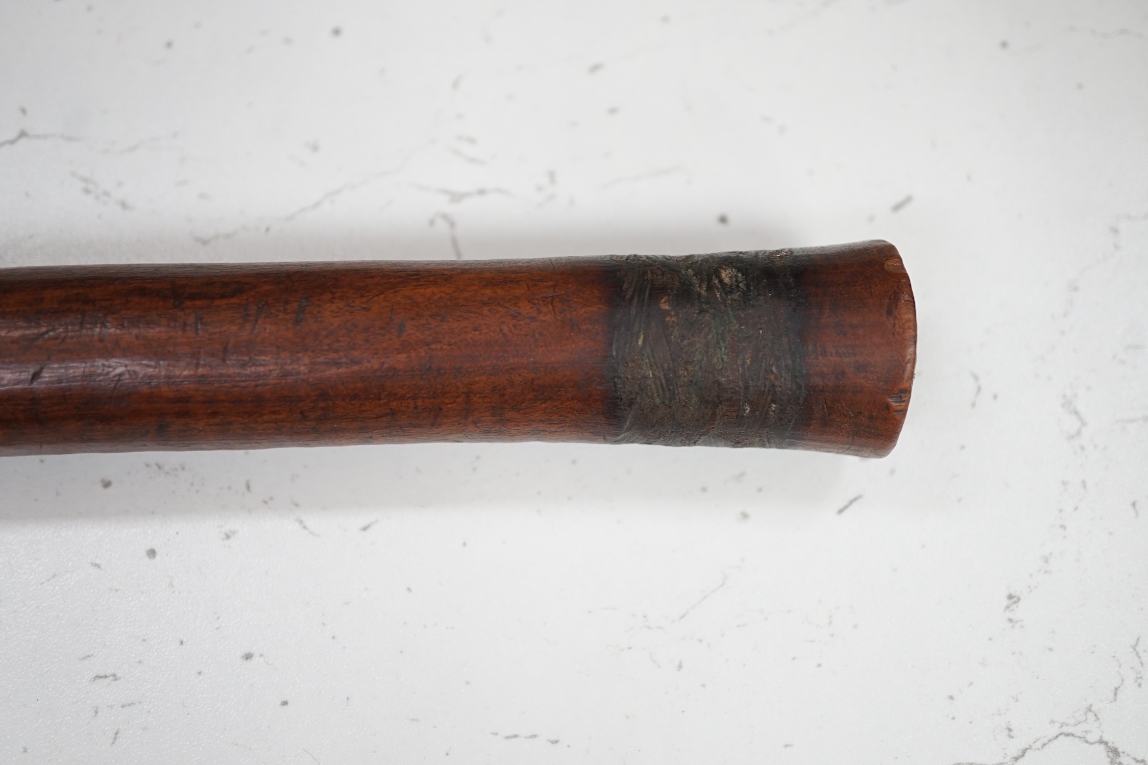 A Polynesian wood throwing club, 40cm tall